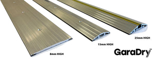 GaraDry commercial door thresholds lined up showing the entire range of commercial door seals